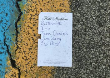Shopping list on Hotel Monteleone stationery on pavement: buttermilk, ice, Jack Daniels, ling zang, Car Max.